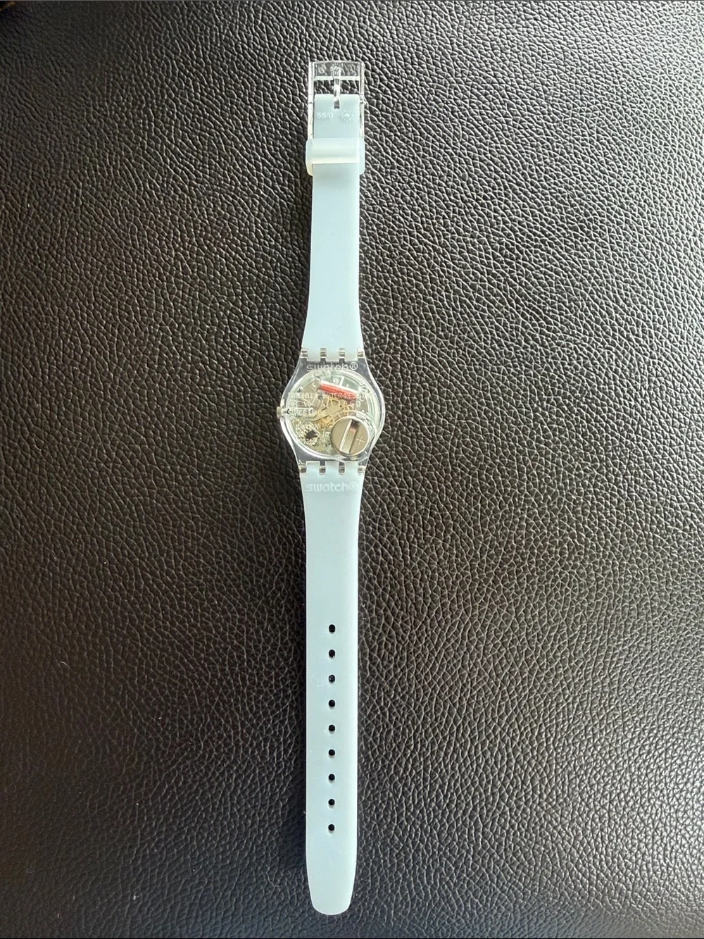 Light Blue Silicone Swatch Watch with opalescent face Like new with new battery